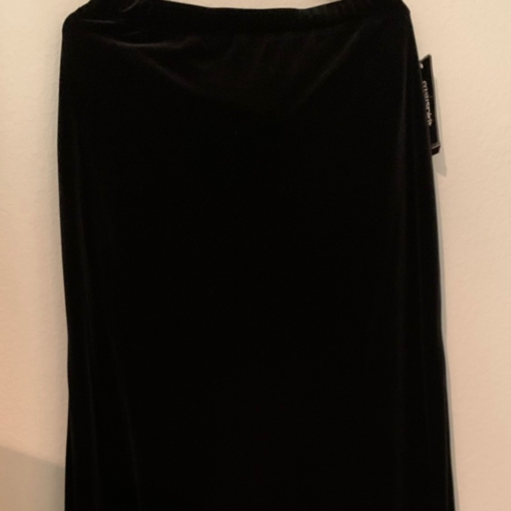 New w/tag. Maxi black velvet skirt. Large. 17 inch elastic flex waist. Gorgeous